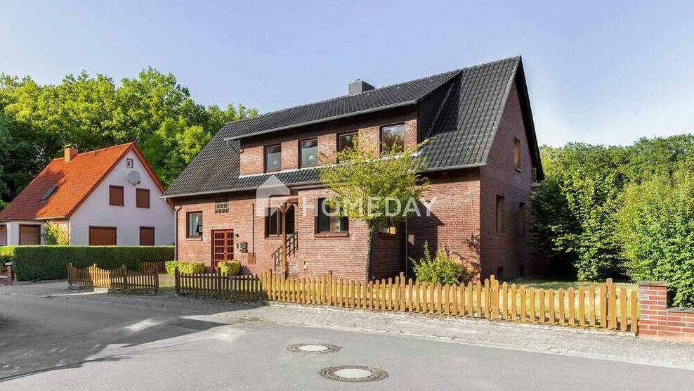 Naturnahes Wohnen: Attraktives Ein- bis Zweifamilienhaus mit großem Grundstück, Garage und Werkstatt
