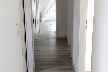 3,5-Zimmer-Wohnung mit zusätzlicher Ebene im Dachspitz.