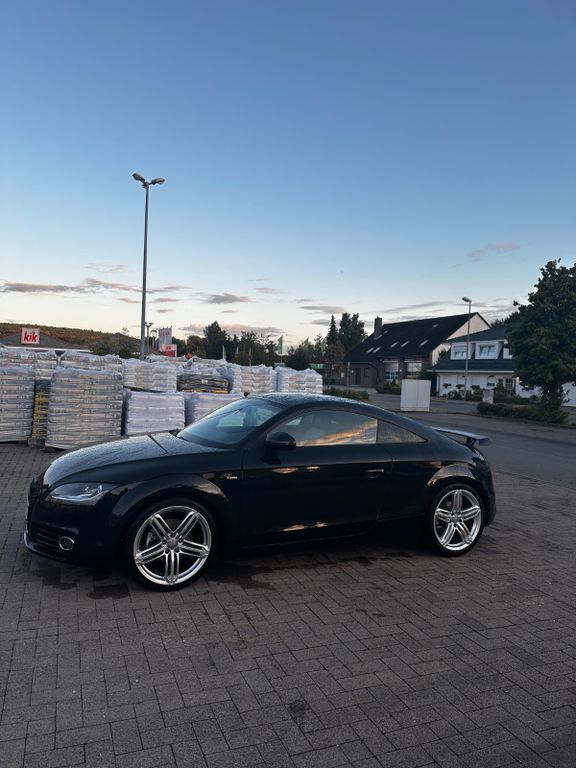 TT