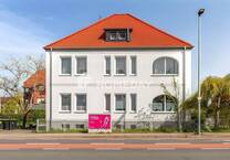 Attraktive Investitionsmöglichkeit: Mehrfamilienhaus mit 3 Wohneinheiten und Garten