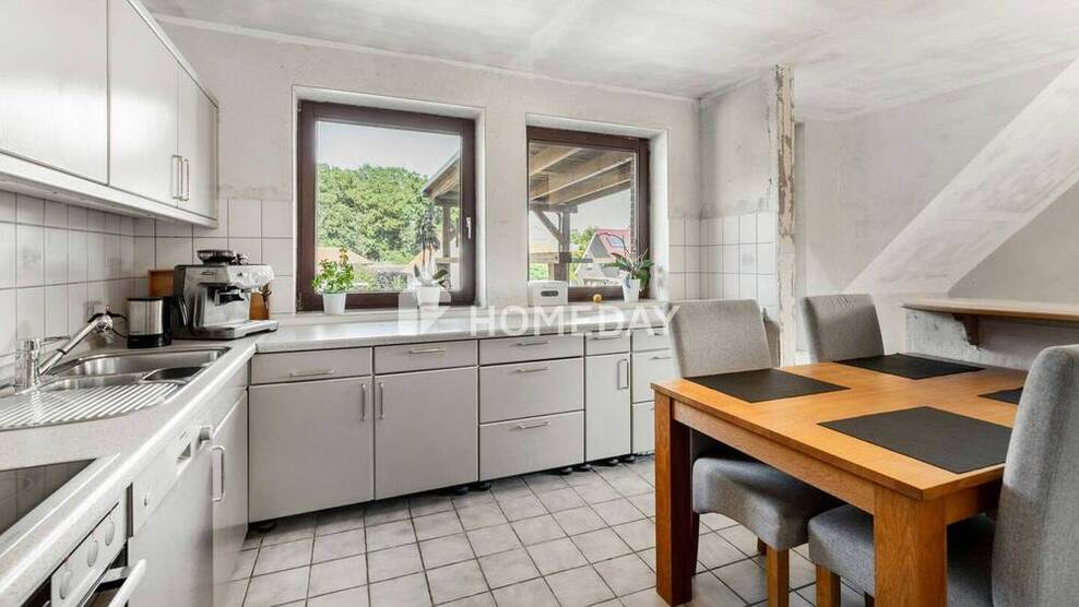 Naturnahes Wohnen: Attraktives Ein- bis Zweifamilienhaus mit großem Grundstück, Garage und Werkstatt