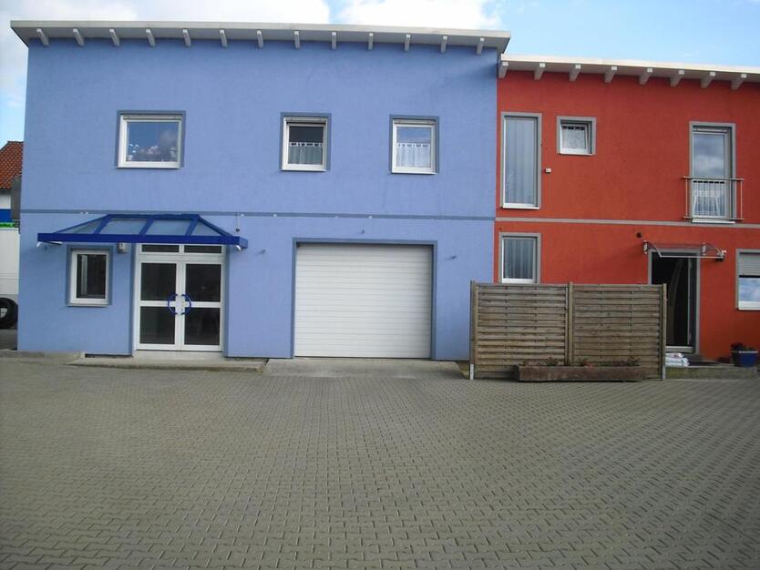 Mehrfamilienhaus mir Gewerbe