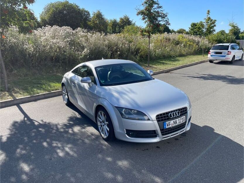 TT