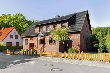 Naturnahes Wohnen: Attraktives Ein- bis Zweifamilienhaus mit großem Grundstück, Garage und Werkstatt