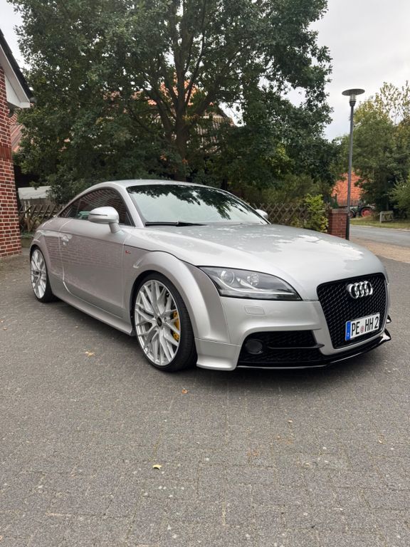 TT